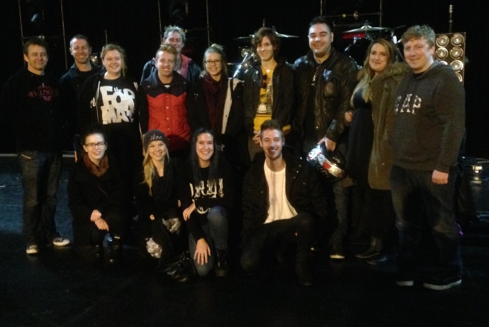 Tim Dalton backstage and on stage with students at 5 Seconds of Summer.